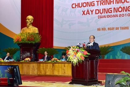 Chủ tịch Quốc hội Nguyễn Sinh Hùng phát biểu tại Hội nghị tổng kết 5 năm thực hiện Chương trình mục tiêu quốc gia xây dựng NTM. Ảnh: VGP/Nhật Bắc.
