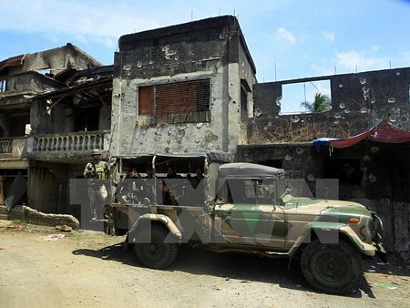Binh sỹ Philippines làm nhiệm vụ tại thị trấn Butig, tỉnh Lanao del Sur, Mindanao ngày 1/3. (Nguồn: AFP/TTXVN)