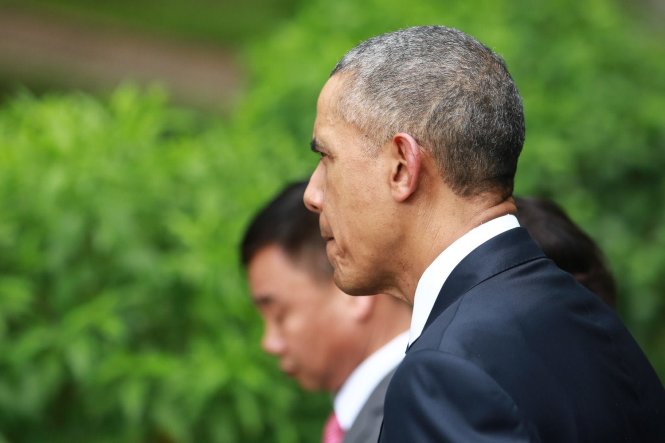 Tổng thống Obama di chuyển vào Nhà sàn Bác Hồ - Ảnh: Nguyễn Khánh