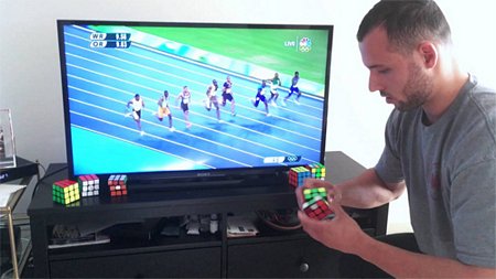 Nhà vô địch xoay Rubik “đua tốc độ” với Usain Bolt