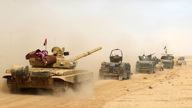 Quân đội Iraq tiến về Mosul ngày 17/10. (Nguồn: AFP)