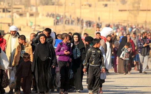 Người dân Iraq đang bị IS lợi dụng làm lá chắn sống. (Ảnh: Reuters)