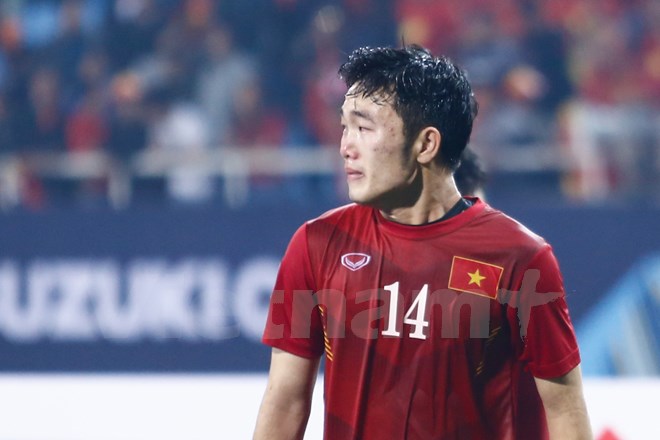 Xuân Trường khóc nức nở sau thất bại trước Indonesia ở kỳ AFF Cup đầu tiên trong sự nghiệp của anh. (Ảnh: Hiếu Lương/Vietnam+)