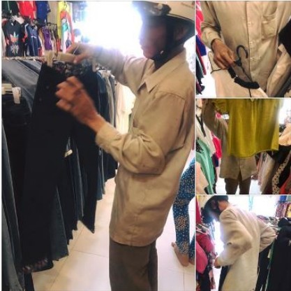 Ông bố nghèo vào shop thời trang chọn lựa để mua cho con một bộ đồ đón Tết Đinh Dậu vừa qua.