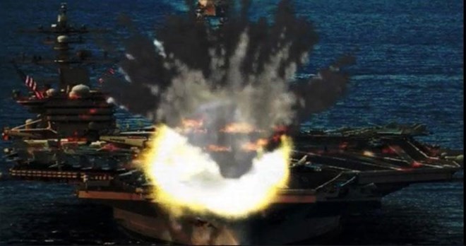Hình ảnh tàu sân bay Mỹ bị tấn công mà Triều Tiên công bố. (Nguồn: Yonhap News)
