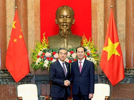 Chủ tịch nước Trần Đại Quang tiếp Ủy viên Quốc vụ, Bộ trưởng Bộ Ngoại giao Trung Quốc Vương Nghị. (Ảnh: Nhan Sáng/TTXVN)