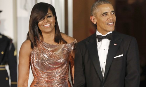Cựu Tổng thống Mỹ Obama và phu nhân. Ảnh: AP