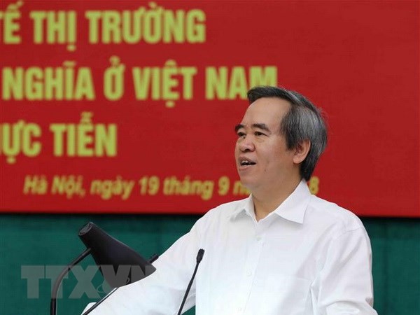  Trưởng Ban Kinh tế Trung ương Nguyễn Văn Bình phát biểu khai mạc hội thảo. (Ảnh: Phương Hoa/TTXVN)