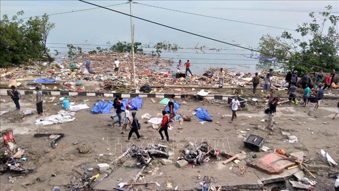 Thi thể các nạn nhân vụ động đất và sóng thần ở Palu, đảo Sulawesi, Indonesia ngày 28/9/2018. Ảnh: AFP/ TTXVN