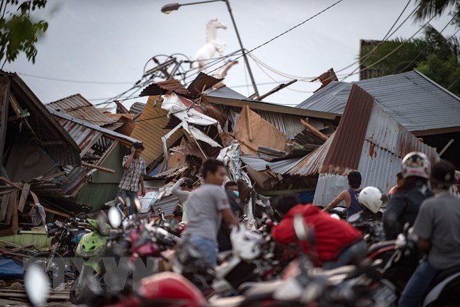 Nhà cửa bị tàn phá nghiêm trọng sau các trận động đất và sóng thần tại tỉnh Trung Sulawesi, Indonesia ngày 29/9/2018. (Nguồn: AFP/TTXVN)