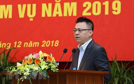 Phó Tổng giám đốc Thông tấn xã Việt Nam Lê Quốc Minh phát biểu tham luận tại hội nghị. (Ảnh: Phương Hoa/TTXVN)