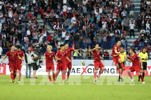 Niềm vui chiến thắng của các tuyển thủ Việt Nam trong trận đấu gặp tuyển Jordan tại Dubai, Các tiểu vương quốc Arab thống nhất ngày 20/1/2019. Ảnh: AFP/TTXVN