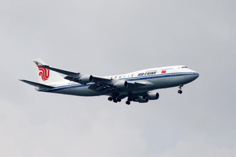 Nhà lãnh đạo Kim Jong-un đã tới Singapore năm ngoái trên một chiếc Boeing 747 của Air China. Ảnh: Reuters