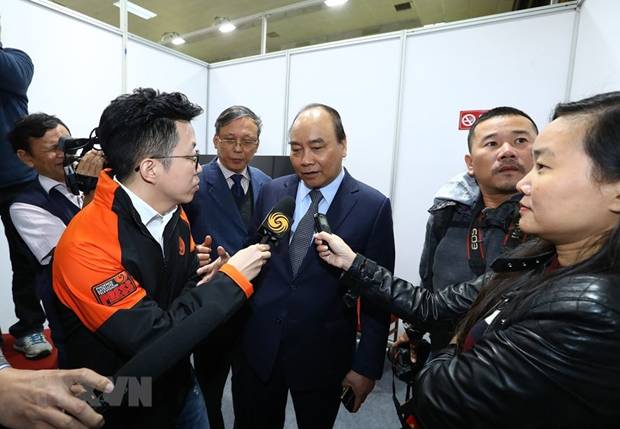  Thủ tướng Nguyễn Xuân Phúc đã có cuộc trả lời phỏng vấn nhanh với báo chí quốc tế tại Trung tâm Báo chí quốc tế. (Nguồn: TTXVN)