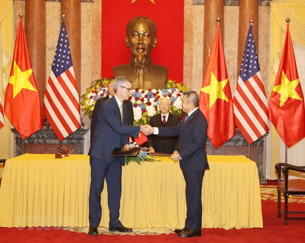  Lễ ký Thỏa thuận hợp tác chiến lược trong lĩnh vực công nghệ thông tin hàng không giữa Việt Nam-Hoa Kỳ. (Ảnh: Trí Dũng/TTXVN)