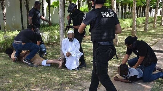 Cảnh sát Malaysia bắt giữ 9 nghi can khủng bố. Ảnh: channelnewsasia.com