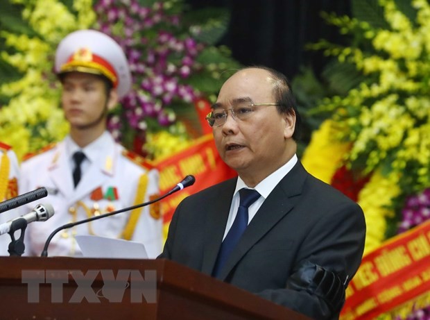 Thủ tướng Nguyễn Xuân Phúc đọc điếu văn tại Lễ truy điệu nguyên Chủ tịch nước, Đại tướng Lê Đức Anh. (Ảnh: Thống Nhất/TTXVN)