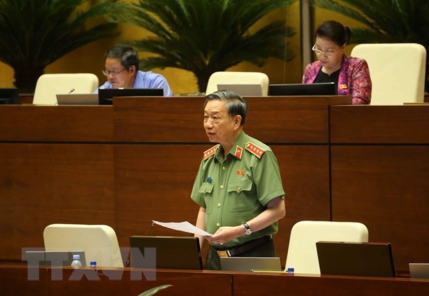 Đại tướng Tô Lâm, Bộ trưởng Bộ Công an giải trình ý kiến của đại biểu Quốc hội. (Ảnh: Doãn Tấn/TTXVN)