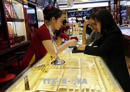  Vàng tại thị trường Hà Nội ở mức 38,85 - 39,17 triệu đồng/lượng. Ảnh: Trần Việt/TTXVN