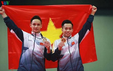 Thanh Tùng (phải) giành vé thứ 2 dự Olympic Tokyo 2020 cho Thể thao Việt Nam. 