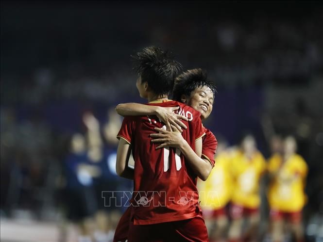 Tuyển nữ Việt Nam sẽ tái đấu nữ Thái Lan ở chung kết. Ảnh: Hoàng Linh/TTXVN