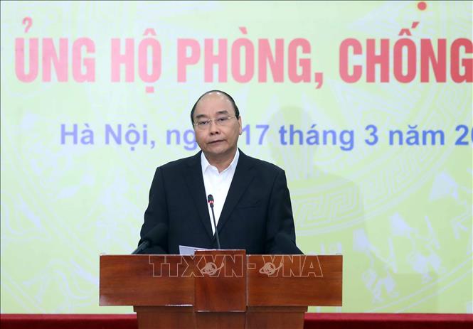 Thủ tướng Nguyễn Xuân Phúc phát biểu tại Lễ phát động toàn dân ủng hộ phòng, chống dịch COVID-19. 