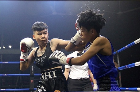 Thu Nhi (trái) quyết tâm làm nên kỳ tích cho boxing Việt Nam.