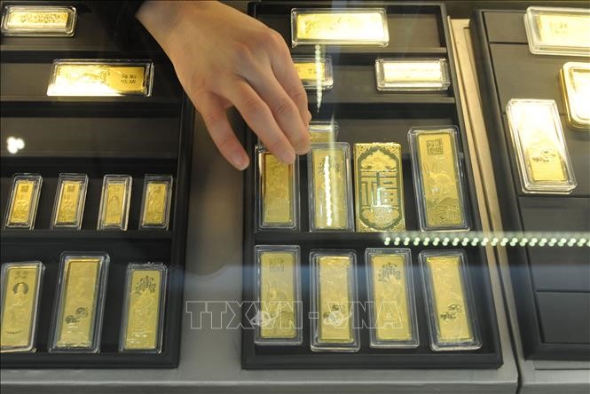 Vàng miếng được bày bán tại một cửa hàng ở tỉnh An Huy, Trung Quốc. Ảnh: AFP/TTXVN