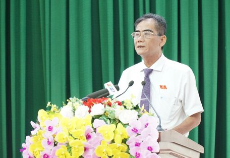 Phó Chủ tịch Thường trực UBND tỉnh- Lê Quang Trung báo cáo kết quả thực hiện kế hoạch phát triển kinh tế- xã hội 6 tháng đầu năm và phương hướng, nhiệm vụ 6 tháng cuối năm.