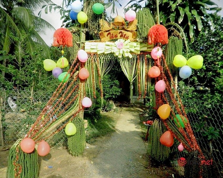 Chiếc cổng cưới làm bằng lá dừa - biểu tượng của người miền Tây sống nước 
