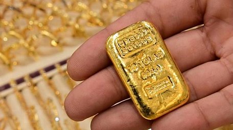  Vàng miếng được bán tại Dubai của UAE. (Ảnh: AFP/TTXVN)