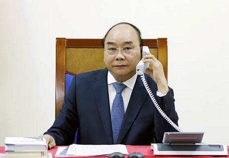 Thủ tướng Nguyễn Xuân Phúc hoan nghênh Nhật Bản chọn Việt Nam là một trong những nước đầu tiên nới lỏng hạn chế đi lại. Ảnh: VGP/Quang Hiếu