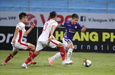 Quang Hải cùng Hà Nội FC bảo vệ thành công chức vô địch cúp Quốc gia. Ảnh: TTXVN