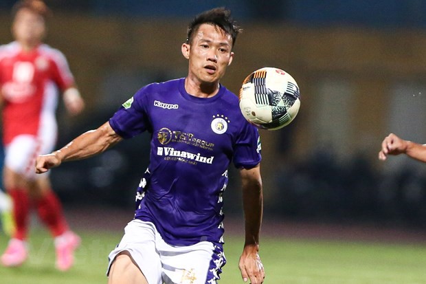 Tiền vệ Tấn Tài tiếp tục gắn bó với Hà Nội FC ở V-League 2021. (Ảnh: Hiển Nguyễn/Vietnam+)