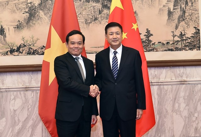 Phó Thủ tướng Trần Lưu Quang và Chủ tịch Ủy ban Quốc gia về phòng, chống ma túy, Bộ trưởng Bộ Công an Trung Quốc Vương Tiểu Hồng - Ảnh: VGP/Hải Minh