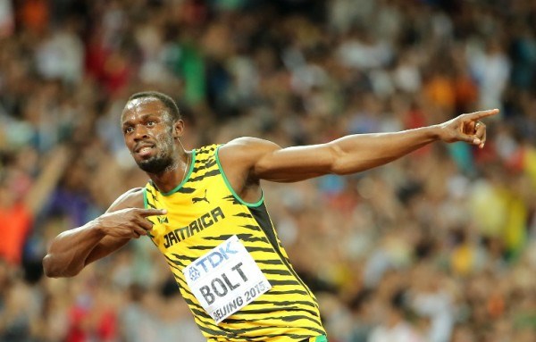 Usain Bolt vừa đăng quang tại Giải vô địch điền kinh thế giới ở Bắc Kinh. (Ảnh: AFP)