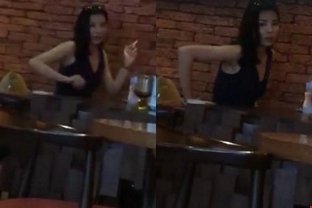 Chiều 11/7  trên mạng lộ hình ảnh hoa hậu Nguyễn Cao Kỳ Duyên bị quay hình đang hút thuốc trong một quán cà phê.