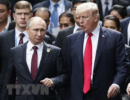 Tổng thống Nga Vladimir Putin (trái) và Tổng thống Mỹ Donald Trump. (Nguồn: AFP/TTXVN)