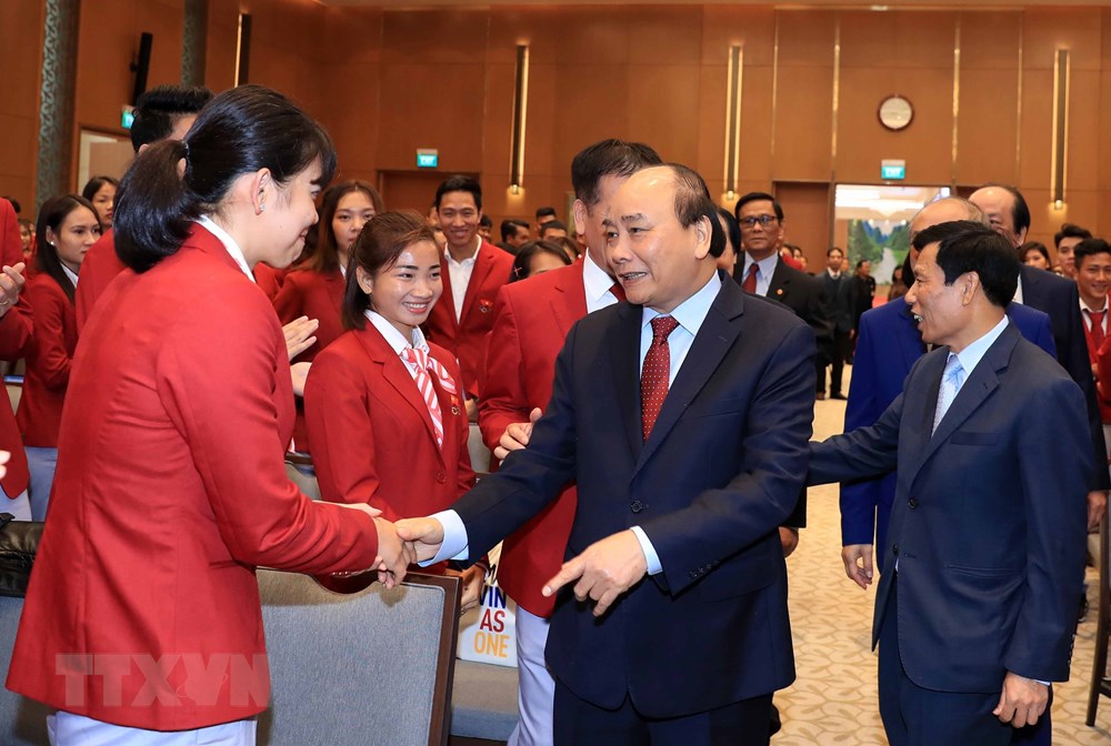  Sáng 22/12, tại Trụ sở Chính phủ, Thủ tướng Nguyễn Xuân Phúc gặp mặt vận động viên, huấn luyện viên đạt thành tích cao tại SEA Games 30. (Ảnh: Thống Nhất/TTXVN)