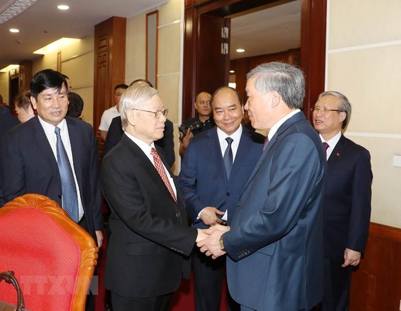  Tổng Bí thư, Chủ tịch nước Nguyễn Phú Trọng với các lãnh đạo Đảng, Nhà nước và các đại biểu dự phiên khai mạc Hội nghị. (Ảnh: Trí Dũng/TTXVN)