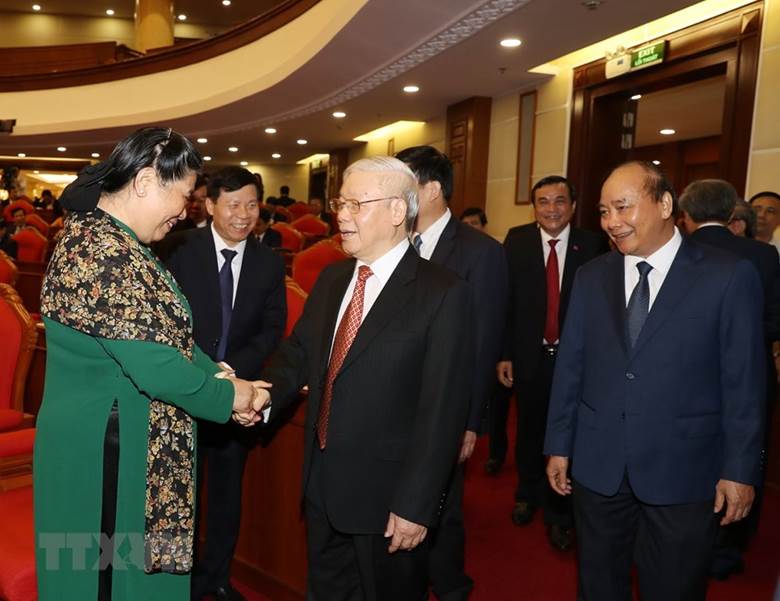  Tổng Bí thư, Chủ tịch nước Nguyễn Phú Trọng với các lãnh đạo Đảng, Nhà nước và các đại biểu dự phiên khai mạc hội nghị. (Ảnh: Trí Dũng/TTXVN)