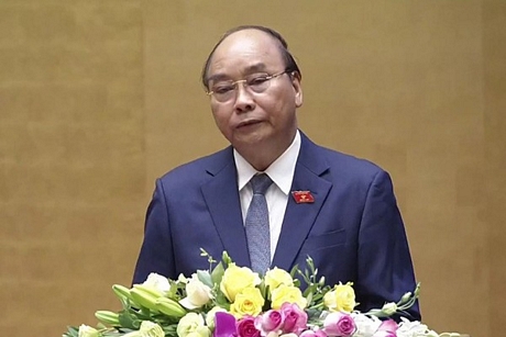 Thủ tướng Nguyễn Xuân Phúc Báo cáo trước Quốc hội trong phiên khai mạc kỳ họp thứ 9 sáng 20/5.