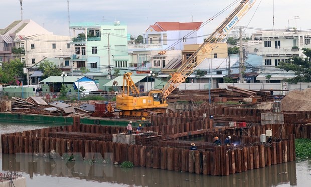 Thi công công trình thủy lợi cống Kênh Nhánh, thành phố Rạch Giá, giúp ngăn mặn, giữ ngọt cho vùng Tứ giác Long Xuyên. (Ảnh: Lê Huy Hải/TTXVN)