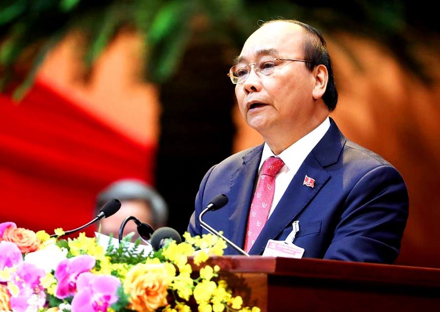 Thay mặt Đoàn chủ tịch, Ủy viên Bộ Chính trị, Thủ tướng Chính phủ Nguyễn Xuân Phúc đọc diễn văn khai mạc Đại hội.
