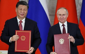 Chủ tịch Trung Quốc Tập Cận Bình và Tổng thống Nga Vladimir Putin. Ảnh: TASS