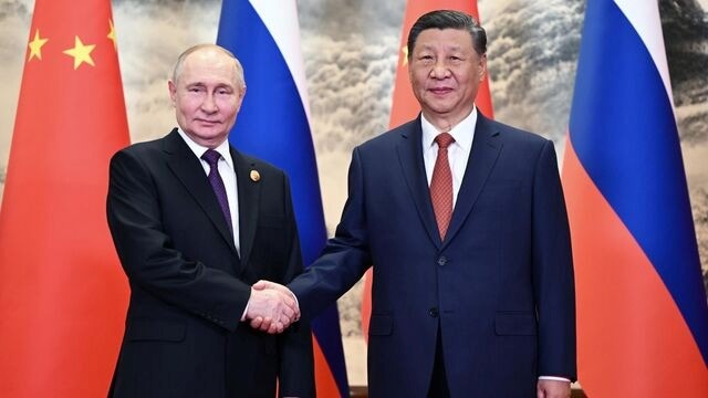 Tổng thống Nga Putin và Chủ tịch Trung Quốc Tập Cận Bình tại cuộc gặp ở Bắc Kinh. Ảnh: RiaNovosti