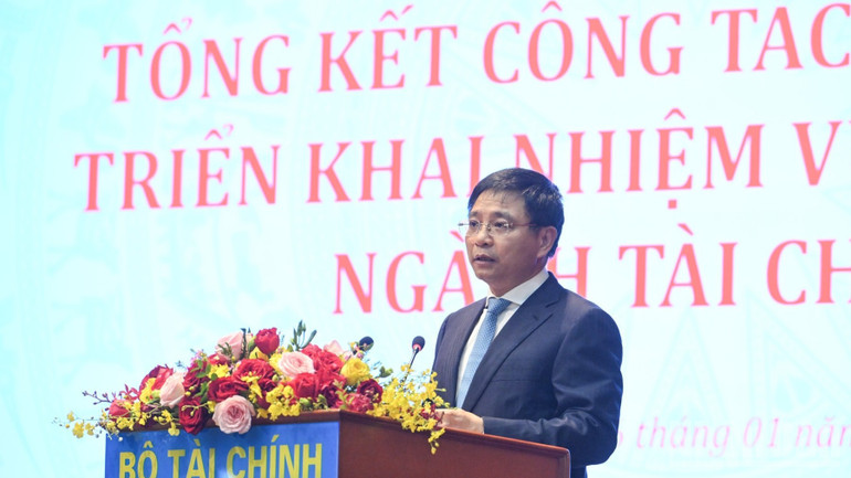 Bộ trưởng Tài chính Nguyễn Văn Thắng phát biểu ý kiến tại hội nghị. (Ảnh: TRẦN HẢI)