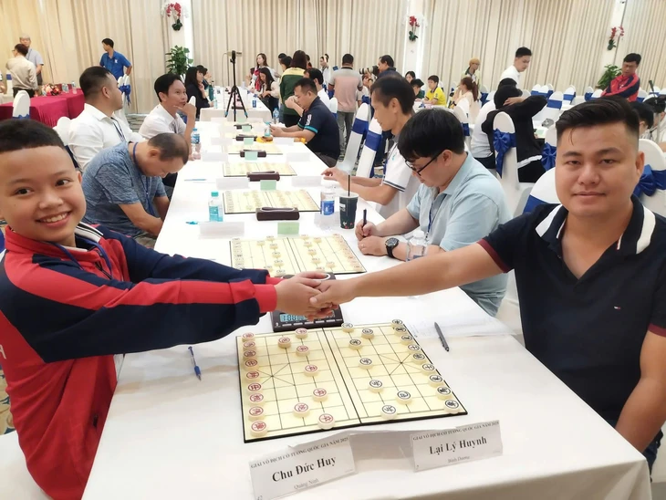 Chu Đức Huy trong một lần so tài với Lại Lý Huynh - Ảnh: LĐCVN

