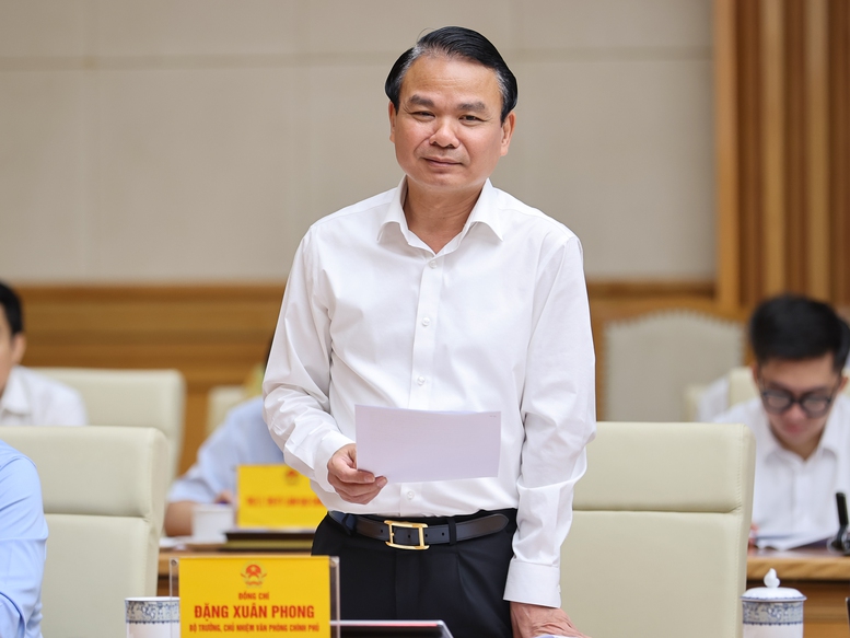 Bộ trưởng, Chủ nhiệm Văn phòng Chính phủ Đặng Xuân Phong báo cáo tại cuộc làm việc - Ảnh: VGP/Nhật Bắc

