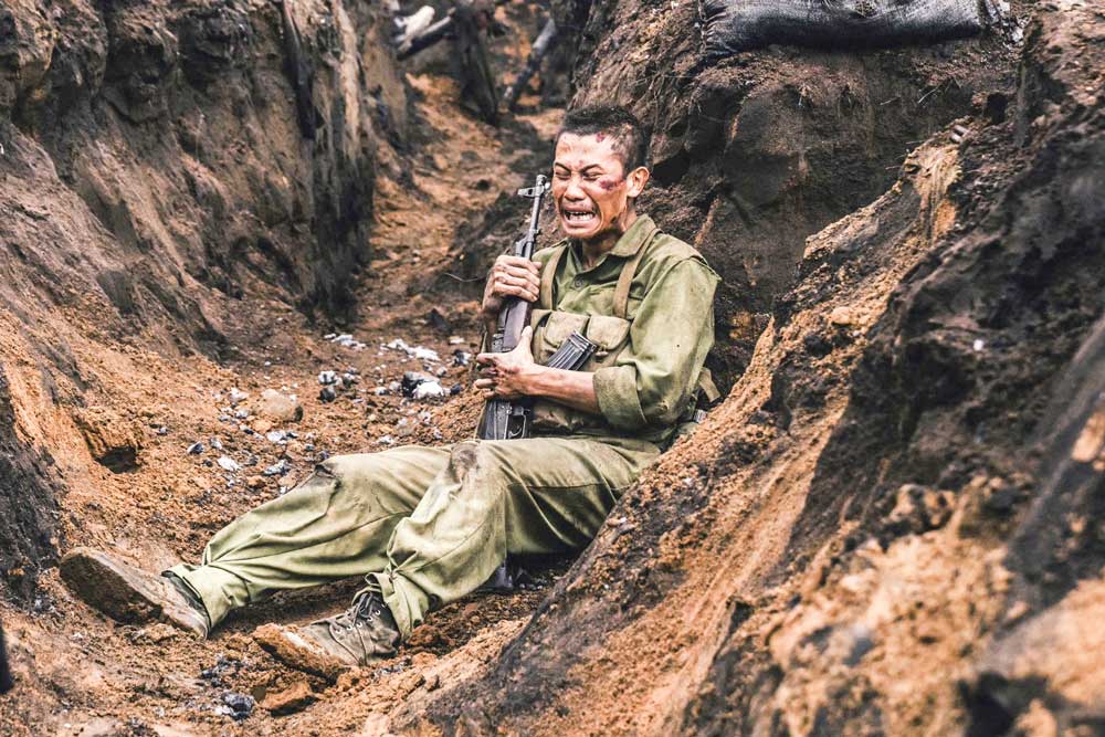Diễn viên Phương Nam (đóng vai Tạ) trong “Mưa đỏ”. Ảnh từ đoàn phim